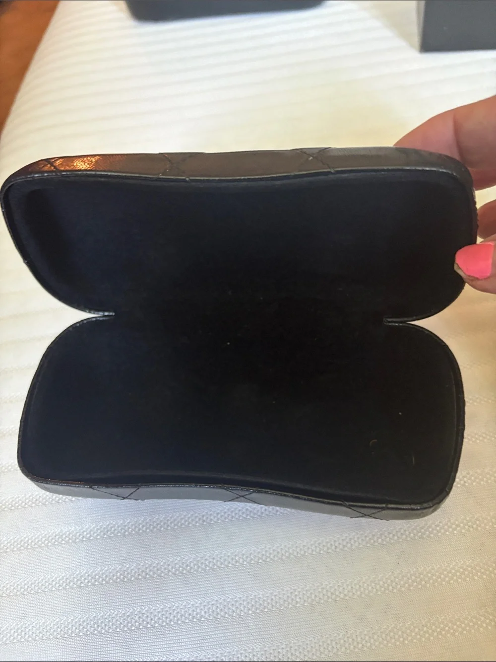 CHANEL Black Oversized Round Women's Sunglasses with iconic bows on each side.